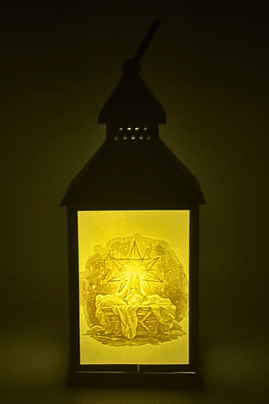 Jesus with star shining behind Manger Litho